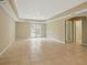 Basement with tile floors and glass doors leading to the backyard at 2802 Arabian Ne Trl, Marietta, GA 30062