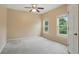 Neutral bedroom with wall-to-wall carpet and natural lighting at 2802 Arabian Ne Trl, Marietta, GA 30062