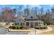 Charming community clubhouse with stone accents, covered porch, and well-maintained landscaping at 2802 Arabian Ne Trl, Marietta, GA 30062