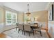 Elegant dining room with large windows and natural light at 2802 Arabian Ne Trl, Marietta, GA 30062