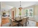 Dining room with natural lighting, crown moulding and chandelier at 2802 Arabian Ne Trl, Marietta, GA 30062