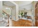 Spacious home foyer with hardwood flooring leading to an office and living area at 2802 Arabian Ne Trl, Marietta, GA 30062