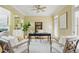Cozy home office featuring natural light, built-in shelving, and hardwood floors at 2802 Arabian Ne Trl, Marietta, GA 30062