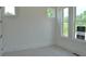 Cozy bedroom with three windows providing natural light at 297 White St # 1, Marietta, GA 30060
