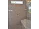 Modern shower boasts a rain shower head and sleek tile at 297 White St # 1, Marietta, GA 30060