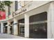 Commercial building entrance featuring a modern design with sleek, dark accents and prominent signage at 20 Marietta Nw St # 15D, Atlanta, GA 30303