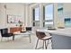 Bright living room with large windows, modern decor, and city view at 20 Marietta Nw St # 15D, Atlanta, GA 30303