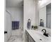 Clean bathroom featuring a vanity, mirror, and tiled floor at 245 Raleigh Way, Villa Rica, GA 30180