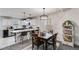 Charming dining area with modern light fixture and natural light at 245 Raleigh Way, Villa Rica, GA 30180