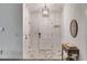 Inviting foyer with white walls, modern light fixture, and elegant tile flooring at 245 Raleigh Way, Villa Rica, GA 30180