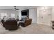 Inviting living room with a modern fireplace, plush seating, and neutral carpet at 245 Raleigh Way, Villa Rica, GA 30180
