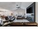 Spacious living room features a sleek fireplace and large windows for natural light at 245 Raleigh Way, Villa Rica, GA 30180