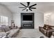 Bright living room with modern ceiling fan, and cozy seating at 245 Raleigh Way, Villa Rica, GA 30180