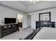 Spacious main bedroom with dark wood furniture, and ensuite bathroom at 245 Raleigh Way, Villa Rica, GA 30180