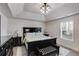 Main bedroom with tray ceiling, dark furniture, and carpet at 245 Raleigh Way, Villa Rica, GA 30180