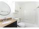 Cozy bathroom featuring a shower and tub combination with granite countertops at 2753 Fireside Se Ct, Marietta, GA 30067