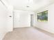 Clean bedroom with neutral carpet, closet and window offering wooded views at 2753 Fireside Se Ct, Marietta, GA 30067