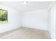 Clean bedroom with neutral carpet, double closet and window offering wooded views at 2753 Fireside Se Ct, Marietta, GA 30067