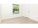 Small bedroom featuring neutral carpet, a window and a closet at 2753 Fireside Se Ct, Marietta, GA 30067