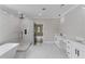 Luxurious bathroom featuring freestanding tub, walk-in shower, and dual vanities at 37 Deer Canyon Dr, Auburn, GA 30011