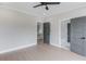 Bedroom with gray doors, recessed lights, and a doorway to a bathroom at 37 Deer Canyon Dr, Auburn, GA 30011