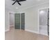 Bedroom features a ceiling fan, two doors, and hardwood flooring at 37 Deer Canyon Dr, Auburn, GA 30011