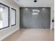 Stylish dining room with modern light fixture and accent wall at 37 Deer Canyon Dr, Auburn, GA 30011