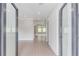 Open foyer with hardwood floors and views into the living area at 37 Deer Canyon Dr, Auburn, GA 30011