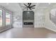 Bright living room showcasing modern fireplace and built-in shelves at 37 Deer Canyon Dr, Auburn, GA 30011