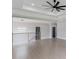 Bright loft featuring a modern railing and smooth hardwood floors at 37 Deer Canyon Dr, Auburn, GA 30011