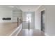 Staircase has hardwood stairs and metal railing with a view into the living room at 37 Deer Canyon Dr, Auburn, GA 30011