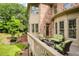 Relaxing back deck offers an inviting outdoor space with comfortable seating and views of the landscaped yard at 9035 Brixham Ct, Suwanee, GA 30024
