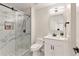 A clean bathroom with a glass shower and single vanity at 9035 Brixham Ct, Suwanee, GA 30024