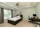A simple bedroom with a single bed and desk at 9035 Brixham Ct, Suwanee, GA 30024