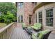 Enjoy outdoor living on the back deck with ample seating and relaxing views of the backyard at 9035 Brixham Ct, Suwanee, GA 30024