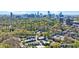 Stunning aerial view with skyline, mature trees and condominium at 13 Ivy Ne Sq, Atlanta, GA 30342