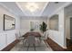 Elegant dining room featuring hardwood floors, decorative molding, and modern decor at 13 Ivy Ne Sq, Atlanta, GA 30342