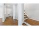 Foyer with hardwood floors and staircase at 13 Ivy Ne Sq, Atlanta, GA 30342