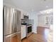 Bright kitchen featuring stainless steel appliances, granite countertops, and white cabinetry at 13 Ivy Ne Sq, Atlanta, GA 30342
