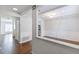 Spacious living room featuring wood floors and an open layout to the kitchen at 13 Ivy Ne Sq, Atlanta, GA 30342