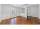 Inviting living room featuring hardwood floors, decorative molding, and natural light at 13 Ivy Ne Sq, Atlanta, GA 30342