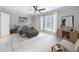 Bright bedroom with neutral tones, a ceiling fan, and coordinated furnishings and decor at 13 Ivy Ne Sq, Atlanta, GA 30342