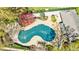 Aerial view showcasing the community pool covered in an attractive outdoor setting at 13 Ivy Ne Sq, Atlanta, GA 30342
