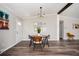 Charming dining area with stylish lighting and open space, seamlessly connected to the kitchen at 3162 Alston Drive Dr, Decatur, GA 30032