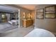 A beautifully designed bathroom with a modern vanity and an open view to the bedroom at 4395 Woodland Brook Se Dr, Atlanta, GA 30339