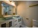 Contemporary bathroom features a double sink vanity with sleek fixtures and ample lighting at 4395 Woodland Brook Se Dr, Atlanta, GA 30339