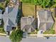 An aerial view shows the home and adjacent properties with well-manicured lawns and mature landscaping at 510 Winder Trl, Canton, GA 30114
