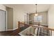 Upstairs hallway with wood floors and view of staircase at 510 Winder Trl, Canton, GA 30114