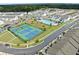 Aerial view of community amenities including pool and tennis courts, perfect for an active lifestyle at 61 N Auburn Landing Pl, Auburn, GA 30011