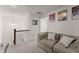 Cozy second floor living space features comfortable seating and stylish decor at 61 N Auburn Landing Pl, Auburn, GA 30011